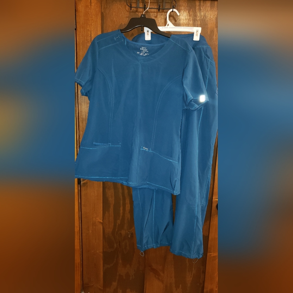 Set of Cherokee womens scrubs Caribbean blue size large.